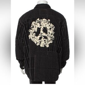 Denim Tears x Levi's
Peace Patchwork Padded Jacket